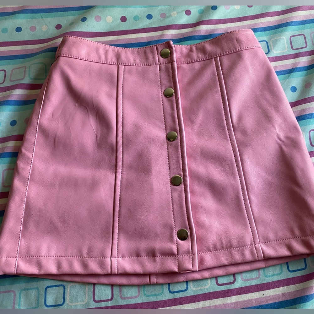 Pink faux leather mini skirt